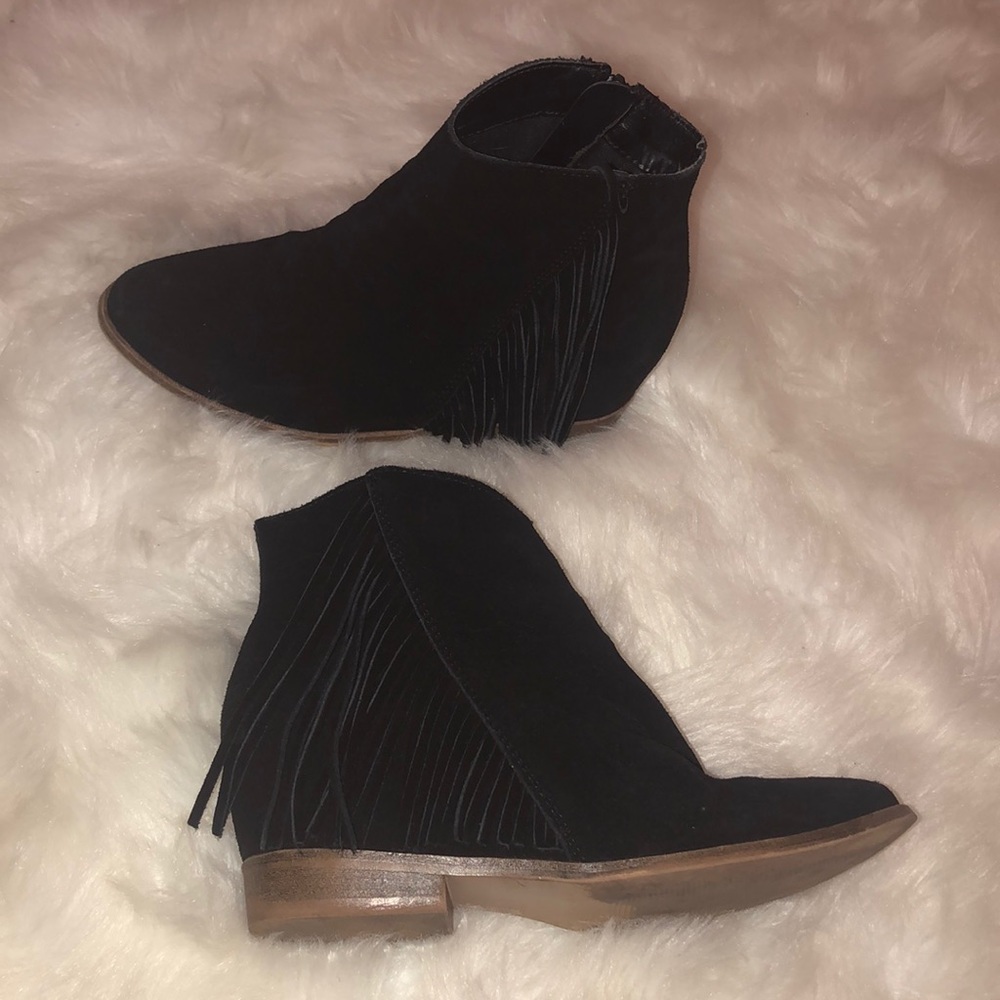 Black ankle boots with fringe
